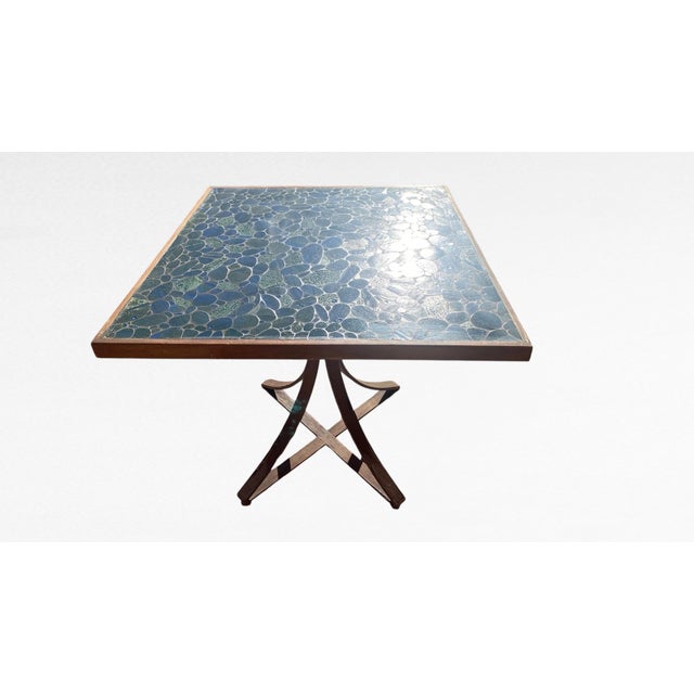 An expressive Mid-Century Modern mosaic tile accent table featuring an intricate pebble-style art tile top executed in...