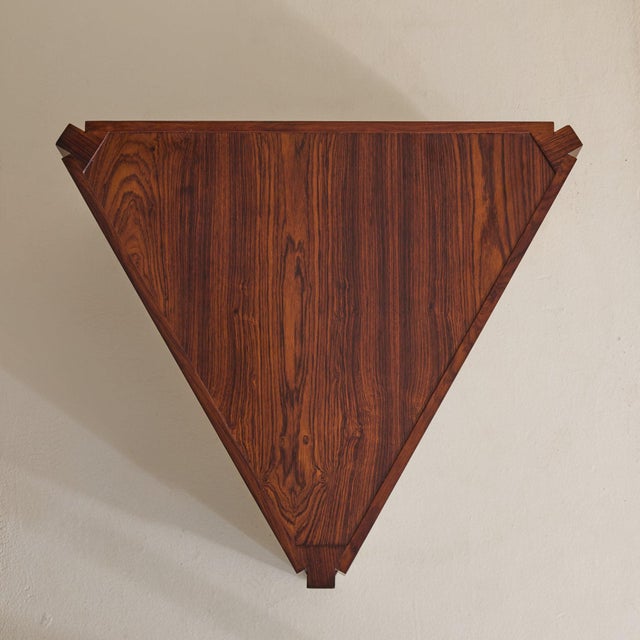A French coffee table from the 1940s, custom made for an estate in France. Triangular in form, the piece sits low and...