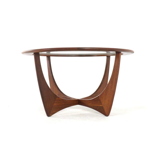 Beautiful round vintage coffee table with a glass top. Of English origin and in neat, very beautiful condition. The table...