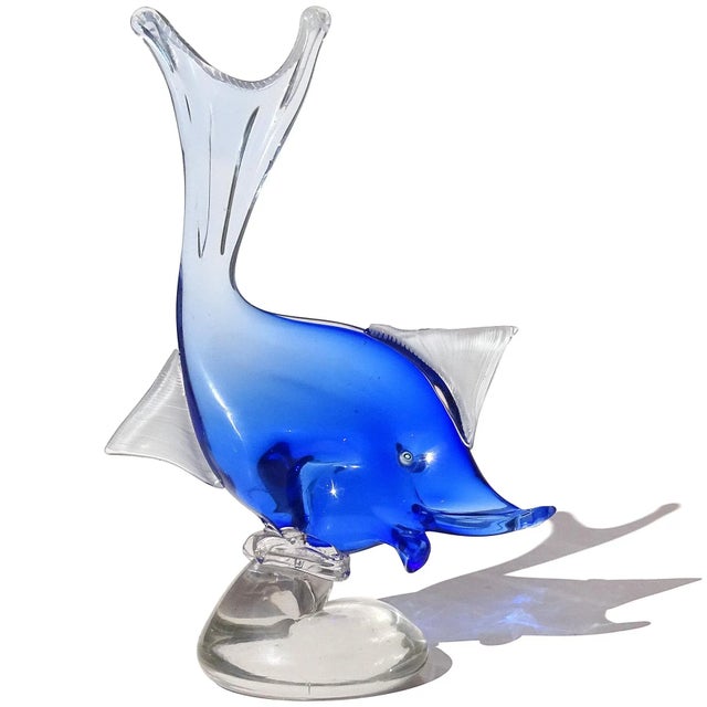 Beautiful vintage Murano hand blown Sommerso sapphire blue to clear Italian art glass fish on base sculpture. Documented...