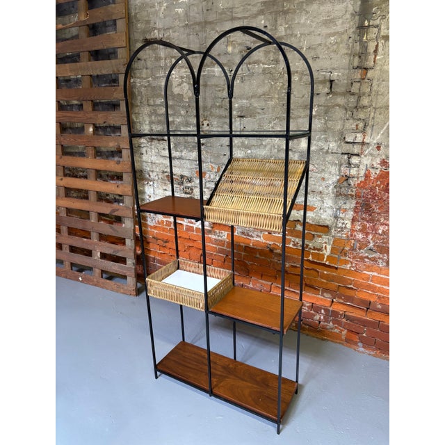 Arthur Umanoff Iron and Wood Shelf/Bar Unit. Great storage space with an enclosed basket for bottles! Top is a glass...
