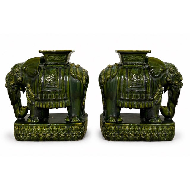 A striking pair of vintage elephant garden stools that brings a sophisticated layer of chinoiserie elegance to any curated...