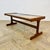 An iconic Mid-Century English Coffee Table from G-Plan, Circa 1960s. The table was made from teak, with ceramic tiles and...