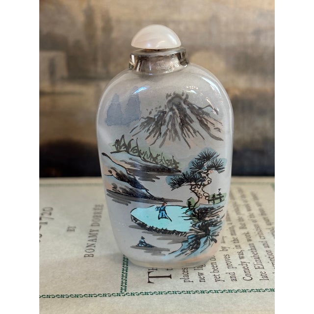 Fabulous fine art motif cased cut-glass snuff bottle with glass cork stopper. Bottle has a different Chinese landscape on...