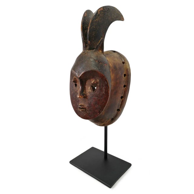 Old Baule rabbit mask from Western Africa. This piece is a beautifully sculptural example of West African tribal artistry,...