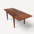 An elegant 1960s Danish modern extension dining table by Skovmand & Andersen for Moreddi, designed to move from an...