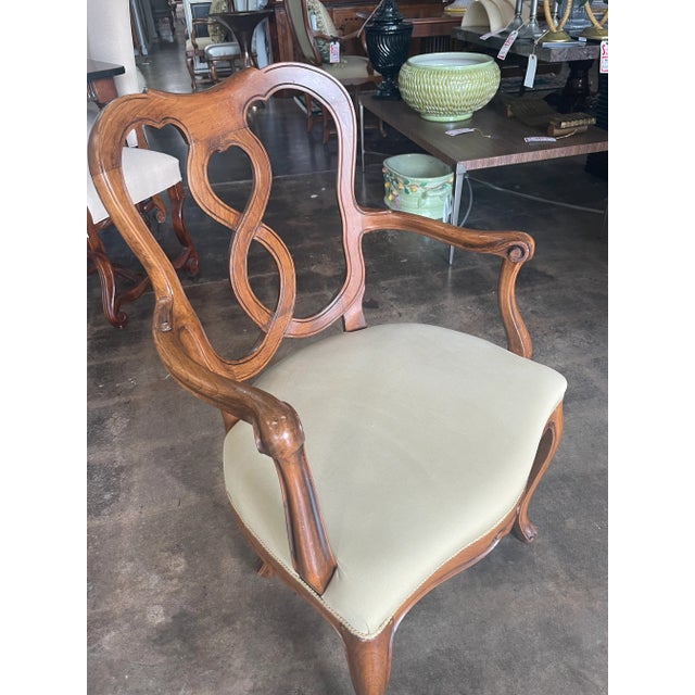Classical Hand carved Armchair With a Walnut Open Back. Made in Italy.