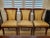 Elevate your dining space with this exceptional, showroom-quality set of eight (8) Neoclassical Regency style cherry...