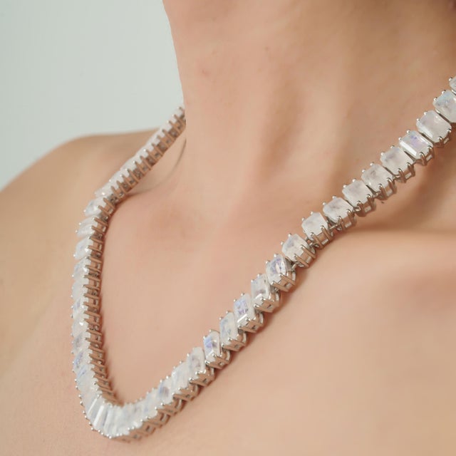 This elegant 3-piece jewelry set by Carat&Her features a handcrafted 18-inch tennis necklace paired with matching drop...