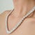 This elegant 3-piece jewelry set by Carat&Her features a handcrafted 18-inch tennis necklace paired with matching drop...