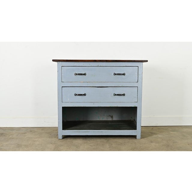 Dimensions: 38 ¼” H x 44 ⅞” W x 25 ¼” D This 19th century English industrial workbench offers plenty of storage for a...