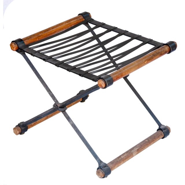 A Mid Century Modern Cleo Baldon for Terra Furniture in Iron, Oak and Pleather Campaign Stool. 1970's A rare piece in...