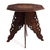 An octagonal Anglo Indian intricately carved hardwood folding table from the early 20th century. The top features...