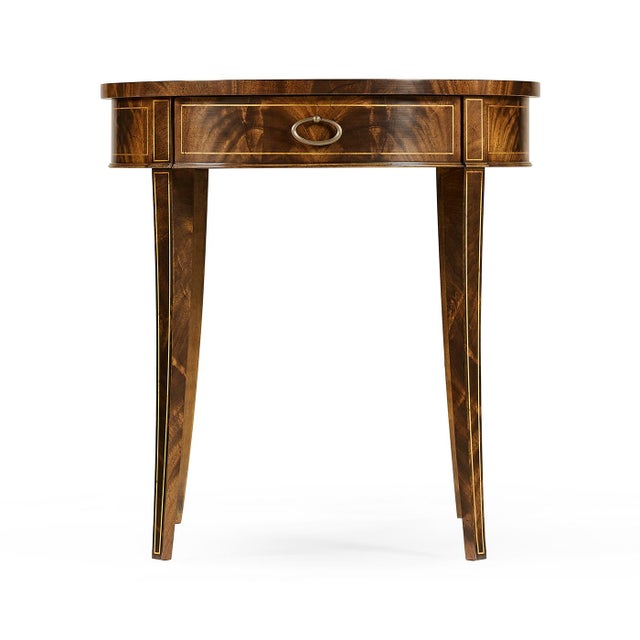 Featuring a radial-matched veneer top and sleek tapered legs. Finished in Light Antique Mahogany, it blends effortlessly...