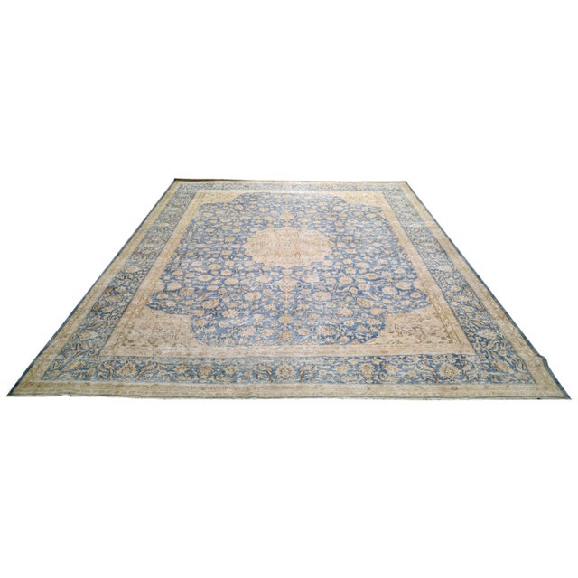 Hand-knotted with care using traditional rug making techniques, this wool rug blends timeless craftsmanship with a modern...