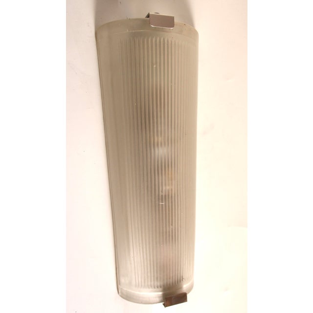 This French wall light is a nice example of french industrial design like the lights from Jielde. The very reduced form...