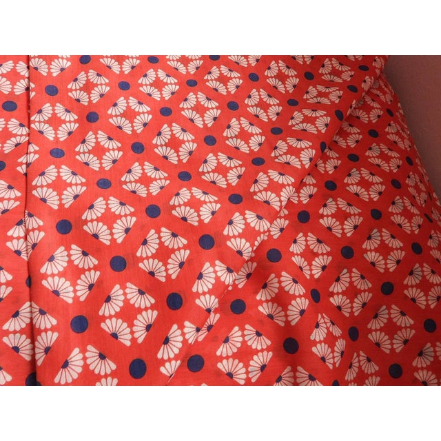 This marvelous vintage 1960s-1970s cotton fabric is created in a gorgeous red, white and blue, geometric daisy pattern....