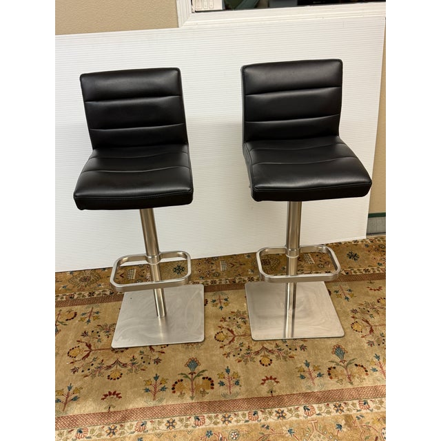 Design Plus Gallery presents a Pair of the Lush Bar Stools from Zuri Furniture. Each stool has a generously padded seat...