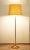 This floor lamp is made from brass with four bulbs and two circuits from 1960s. The height is adjustable. I have official...