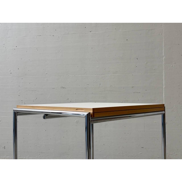 The elegant and functional jean folding table by eileen gray, manufactured by classicon based on the original 1929 design....