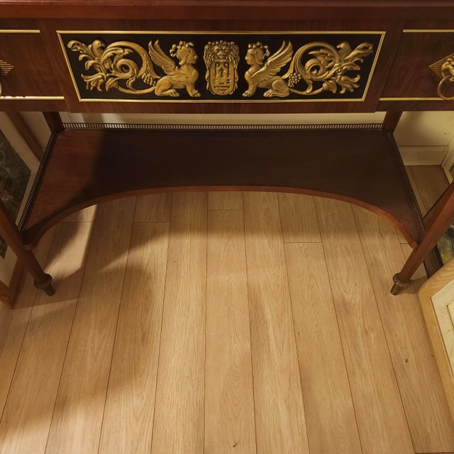 Beautiful Neo Classical Console, Gilt Bronze and wood, circa 1970....with Lions pulls on single drawer and bronze sphinx...