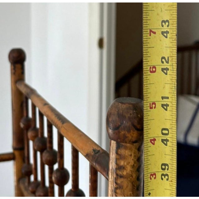 Antique Bamboo Form Etagere Bookcase Circa 1920s. On four supports with four rectangular shelves with X form stretcher on...