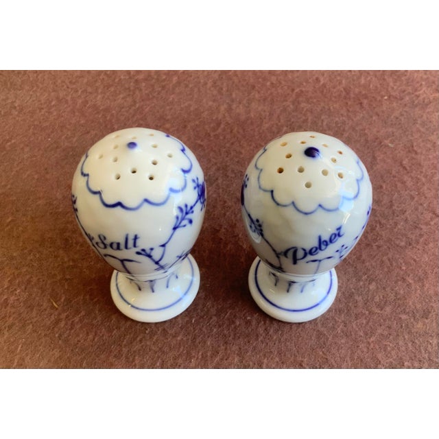 Elegant egg shaped body tapering into a classical base; 2 sets available