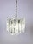 Fantastic ice crystal shaped pendant light by Kalmar. Handmade glass on a metal frame This chandelier emits a wonderful...
