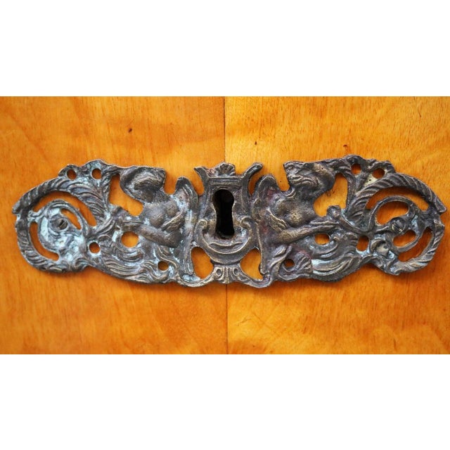 Northern European chest of drawers with secretaire desk veneered in blond wood from the second half of the century. XIX,...