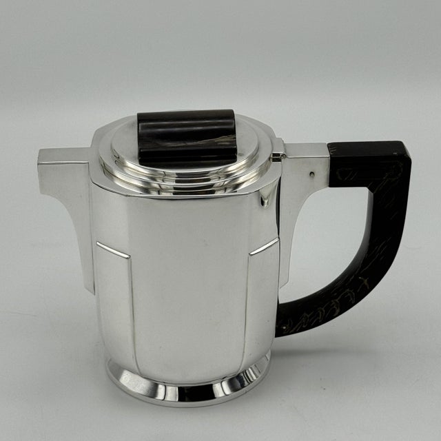 An Art Deco period sterling silver four pieces tea and coffee service from Brussels, Belgium circa 1930. This stunning set...
