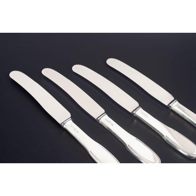 Evald Nielsen dinner knives, set of four. Model number 14. Elegant dinner knives in 830 silver and stainless steel. Model...