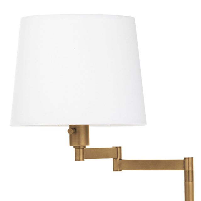 A traditional reading lamp with a modern twist, the Virtue Floor Lamp has the added functionality of adjustability for...