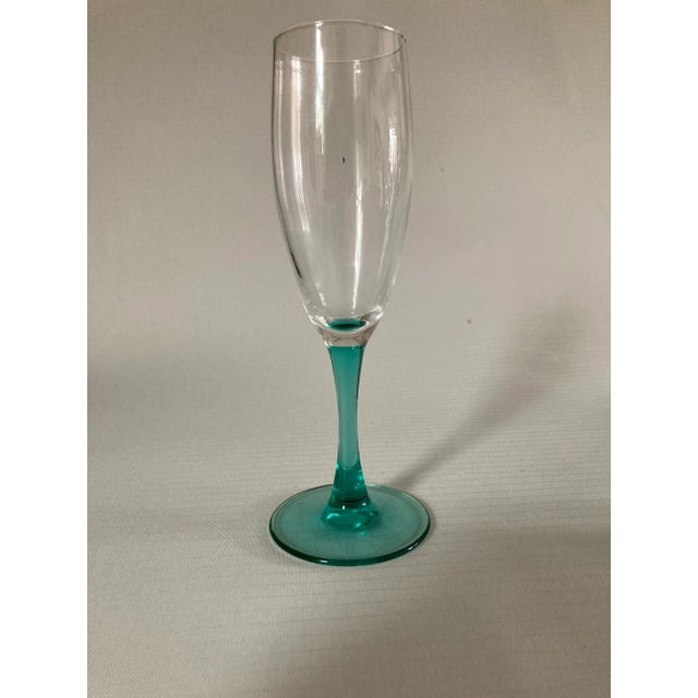 Vintage set of 3 green and clear champagne glasses 2"D X 7.65"H , makers mark reads " France " Excellent condition.