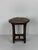 A small occasional table in solid oak, quatrefoil scalloped top hand-carved in deep relief with a lotus design — leaves,...