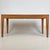 A beautifully made vintage 20th-century coffee table, finely crafted in satinwood and distinguished by its elegant...