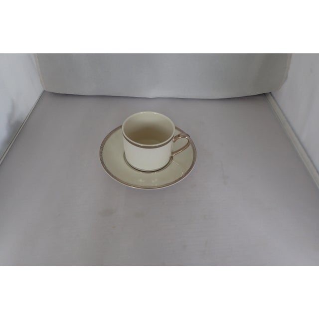 Beautiful fine china with ivory and platinum with greek key design tea cup&saucer makers mark reads " PICKARD Made in USA...