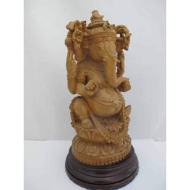 Traditional Seated Lord Ganesha Holding Fruit Carved Wood Hindu Deity God Statue on Pedestal For Sale - Image 3 of 13