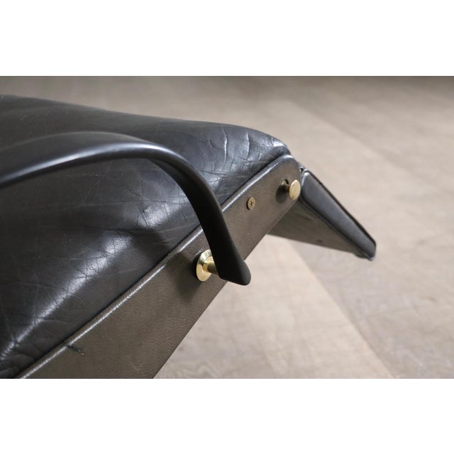 Stunning p40 lounge chair in original black/greenish leather by osvaldo borsani for tecno, italy 1960s. both comfortable...