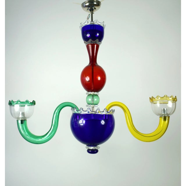 Very big, two-armed muranoglas ceiling lamp. The style refers to Gio Ponti, Venini. Excellent condition. This piece is...