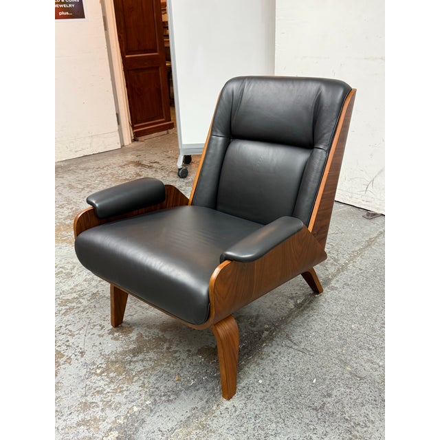 Design Plus Gallery presents the Paulo Bent Ply Leather Chair from West Elm. A striking blend of sculptural form and...