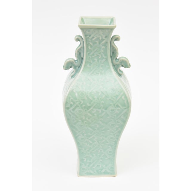 This beautiful mid century modern Chinese vase or vessel is from the 50's. The subtle celadon green has a design on the...