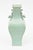This beautiful mid century modern Chinese vase or vessel is from the 50's. The subtle celadon green has a design on the...