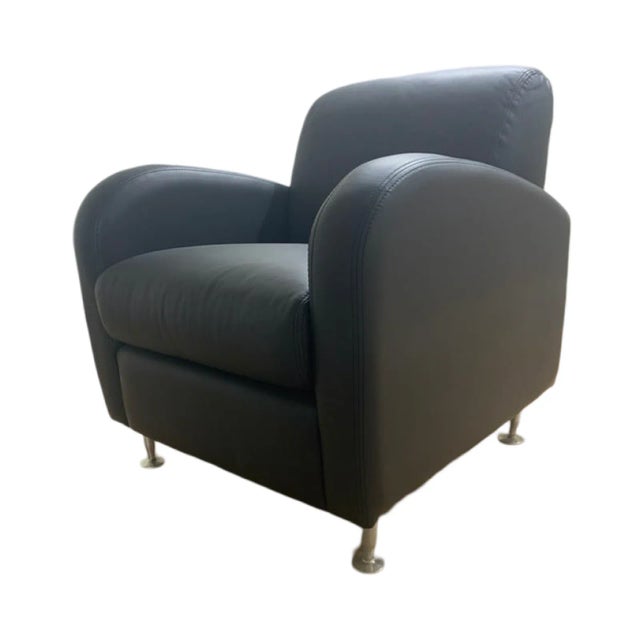 Tagus chair by Brueton, beautiful soft leather with medium density foam in great condition and stainless steel legs.