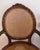 Brown Pair of Early 1900s Louis XVI Style Carved Walnut Arm Chairs With Caned Back & Seat For Sale - Image 8 of 11