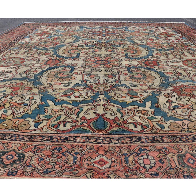 Ivory Antique Persian Sultanabad Rug in Ivory Background, Blue, Salmon & Multi Colors For Sale - Image 8 of 17