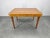 Mid-century modern extendable dining table produced by UP Závody in Czechoslovakia during the 1950s. The table features...