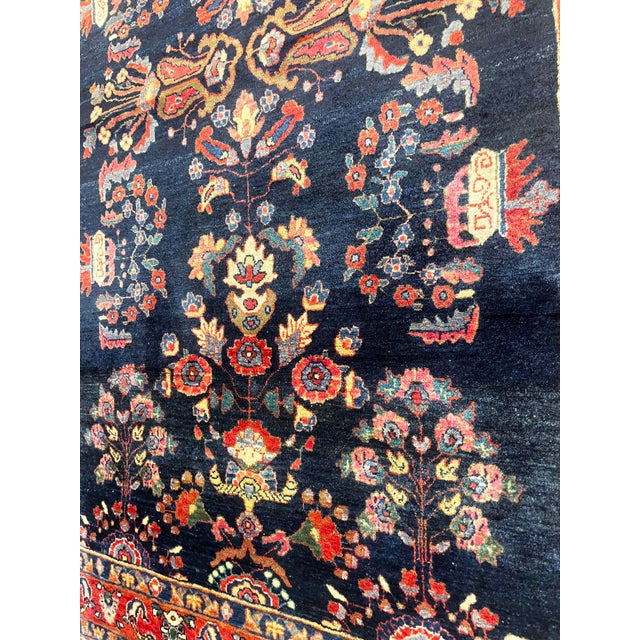 This beautiful antique Persian Mohajeran Sarouk, woven circa 1910, is an excellent example of the refined craftsmanship...
