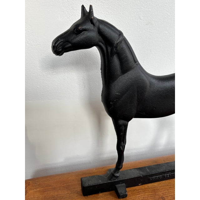 Black equestrian cast iron horse doorstop, made by Virginia Metalcrafters after 1933. Perfect detail for the hunt and...