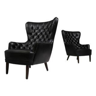 Mid 20th Century Pair of Sculptural Danish Wingback Chairs in Black Leather Attributed to Georg Kofoed For Sale
