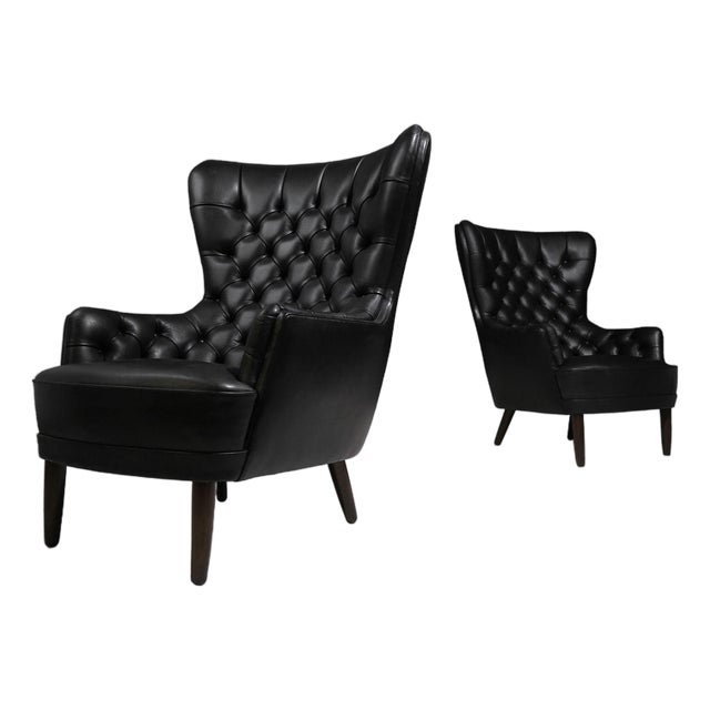 Mid 20th Century Pair of Sculptural Danish Wingback Chairs in Black Leather Attributed to Georg Kofoed For Sale